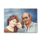 Family pastel portrait of three, of a mom and dad with daughter, on a blue background. Parents with their little girl. The woman has fair skin, brown hair, and blue eyes, wearing a warm brown top. The man is half-bald, with brown hair, and is wearing light brown sunglasses and a light blue shirt. The little kid is blonde with blue eyes, wearing a blue dress.